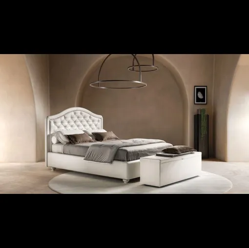 Letto in ecopelle con testiera sagomata e trapuntata Infinity di Bside