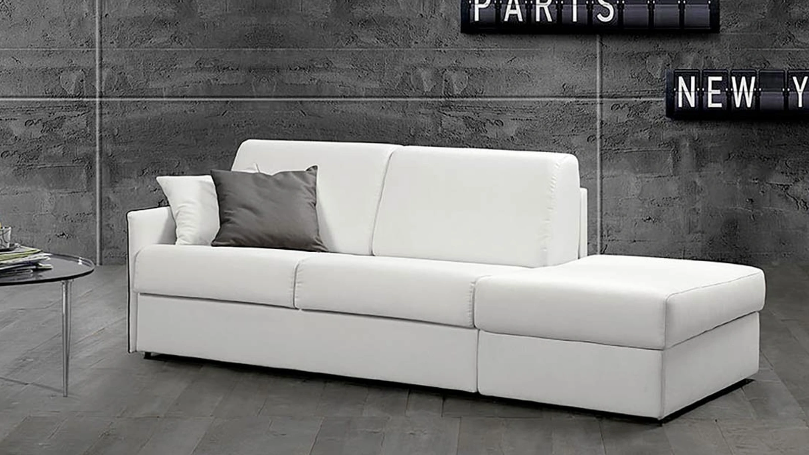 Divano Letto lineare in tessuto con pouf Lollò di Excò